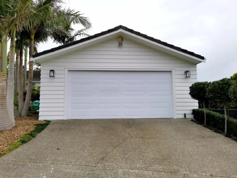 modern white garage door separate from house Web H